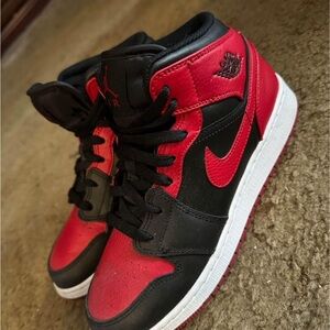 red and black jordan 1s